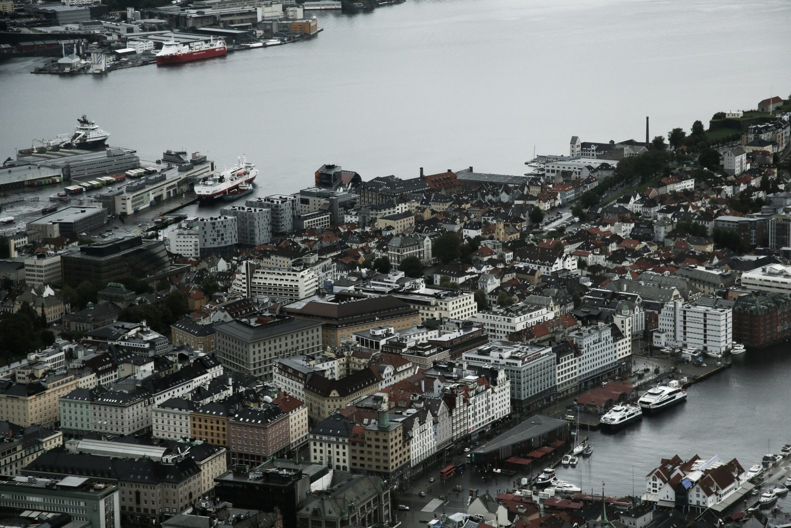 aerial view photography of city buildings surrounded by water